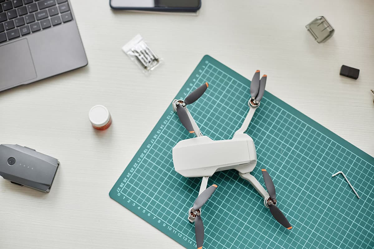Drone on a workshop mat with tools