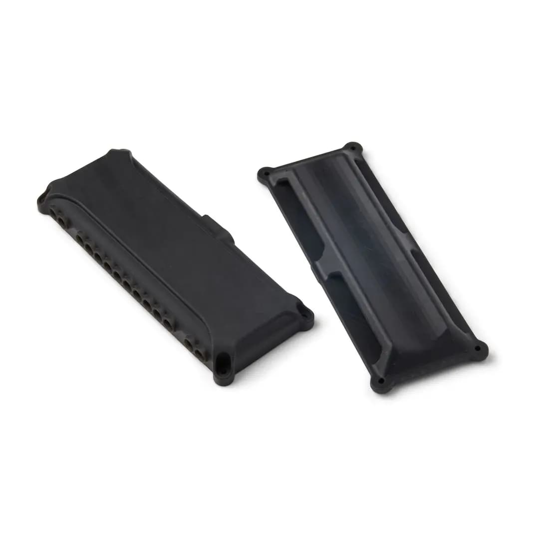 Two black enclosure parts in Tough 2000 Resin V2 on a white background